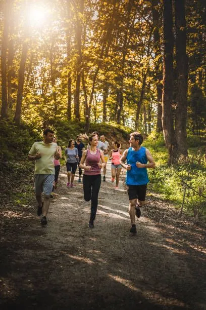Athletic group preparing on a trail path